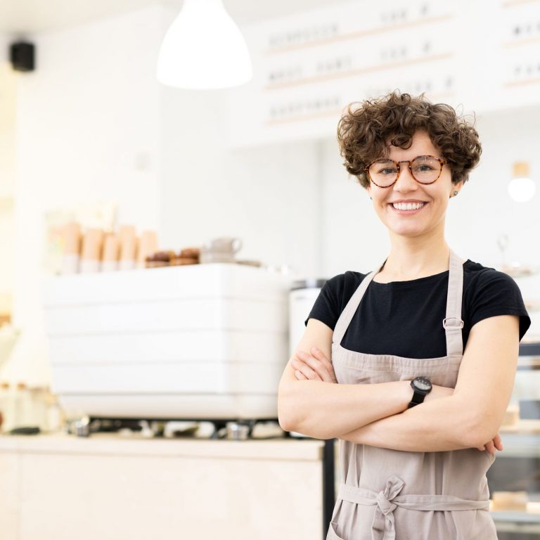 attractive-female-barista-in-coffee-shop-PCW6G7S.jpg